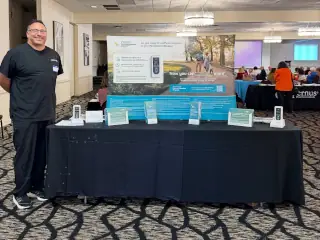 Resource vendor table at Empower Parkinson care partner education retreat